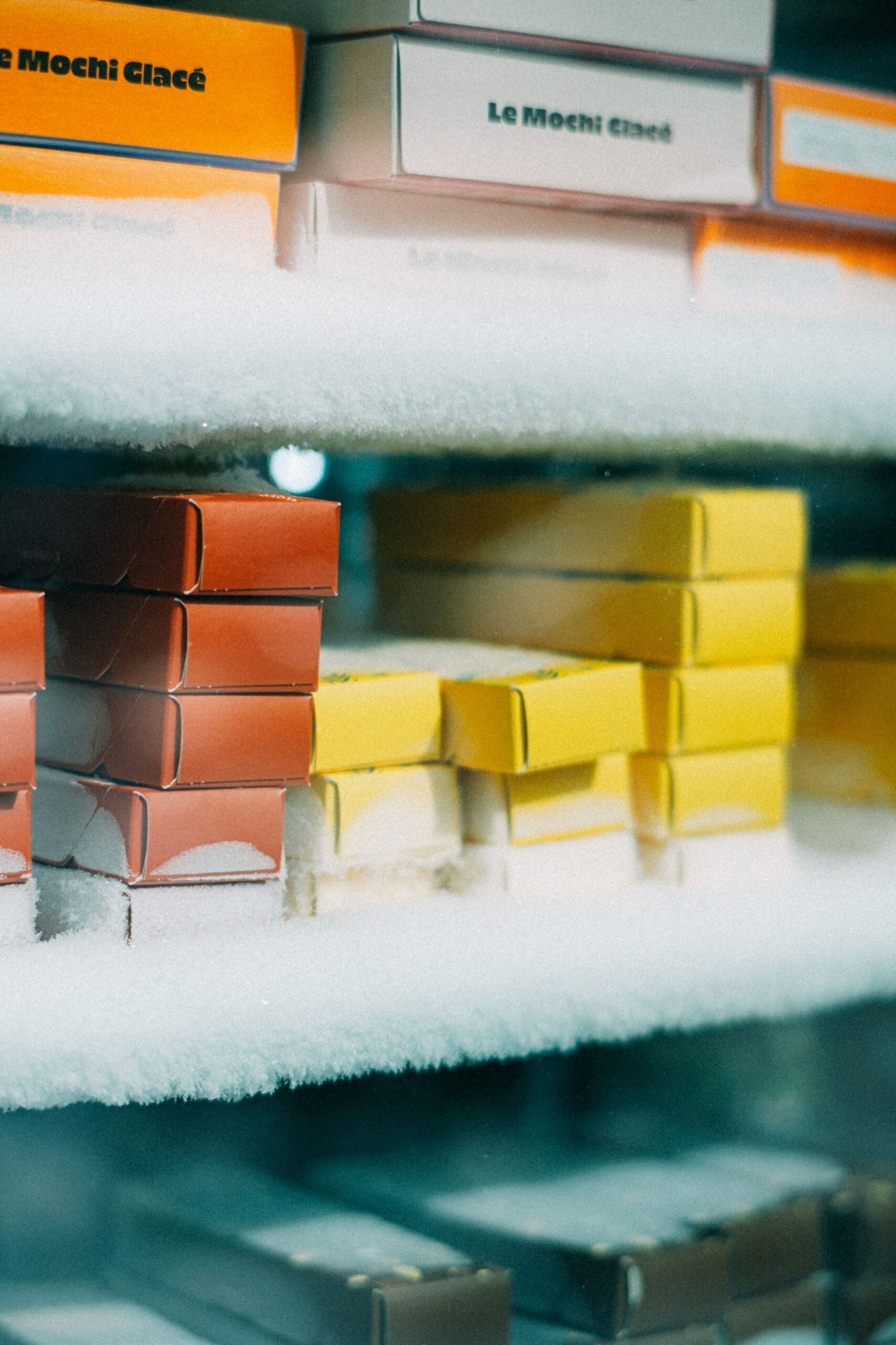 Frosted boxes in a commercial freezer